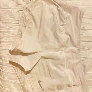white nike shorts
